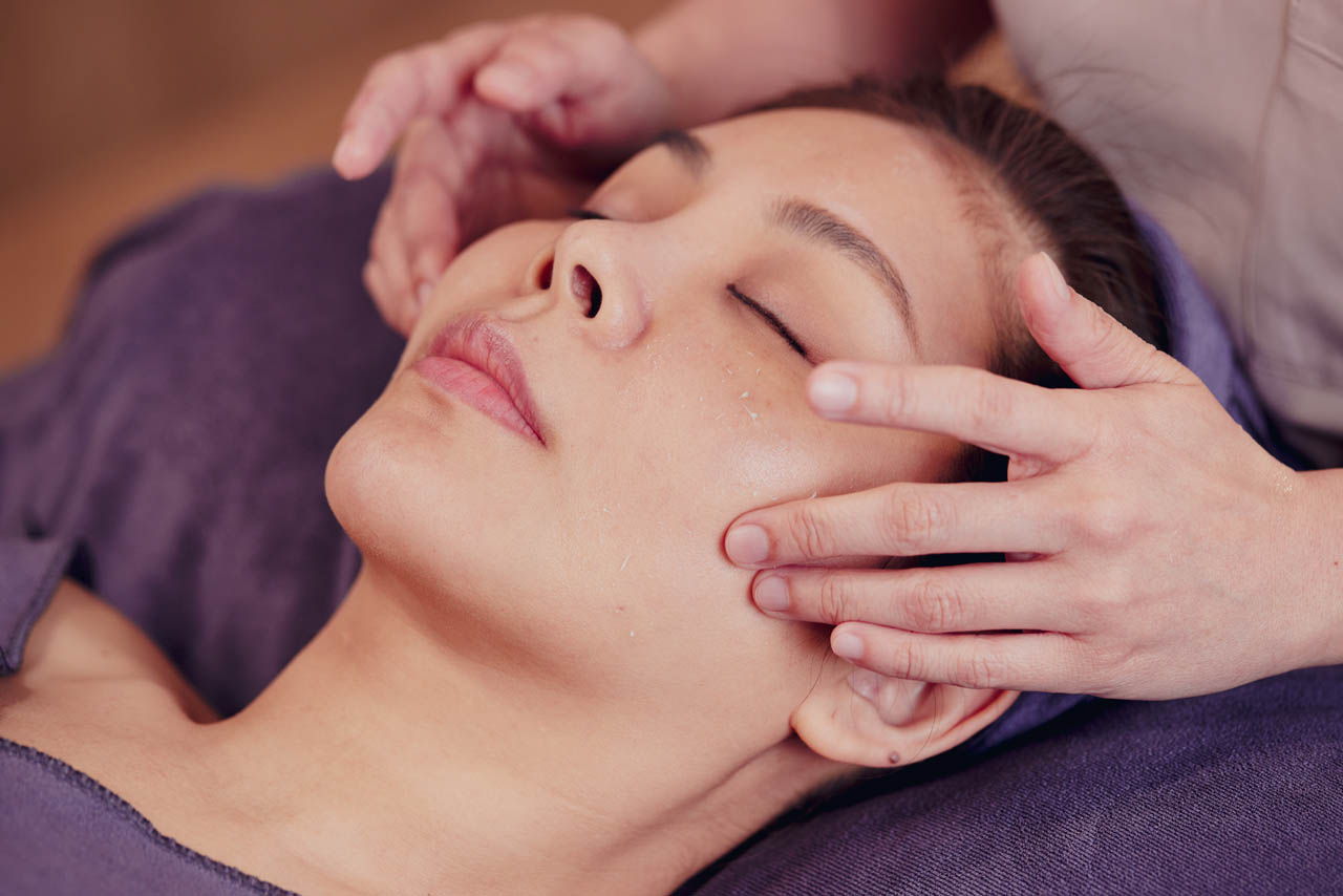 Exfoliation step during an acne facial at SkinLab