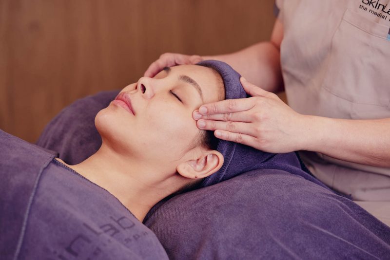 Temple massage during a Melasma Peel facial